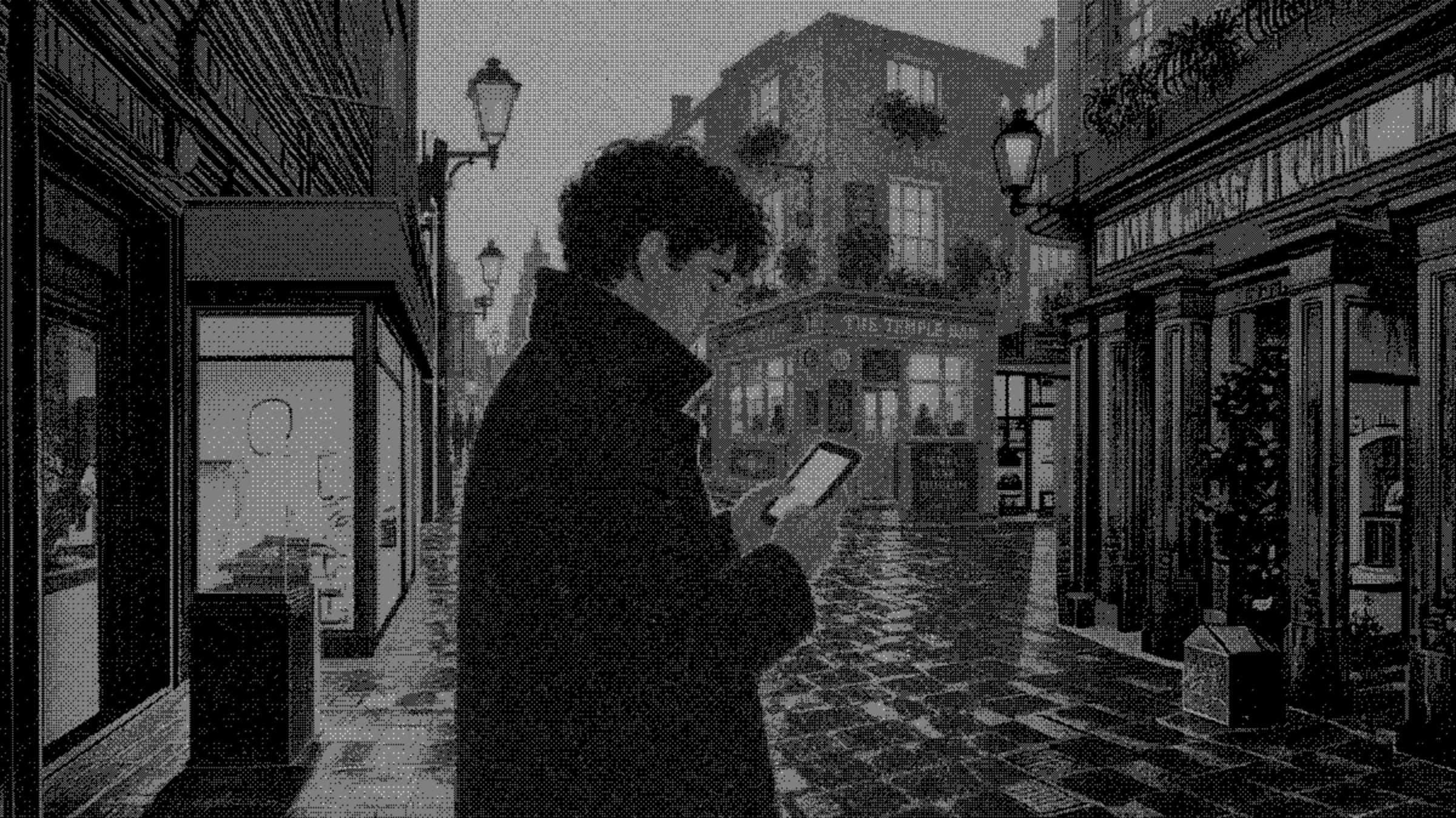 Person in dark coat using a smartphone on a cobblestone street in front of a lit pub.